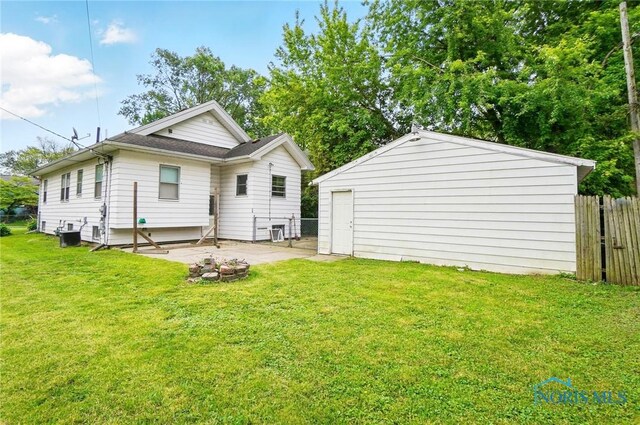 4315 Eastway St, Toledo, OH 43612 - rear view of house featuring a patio and central AC