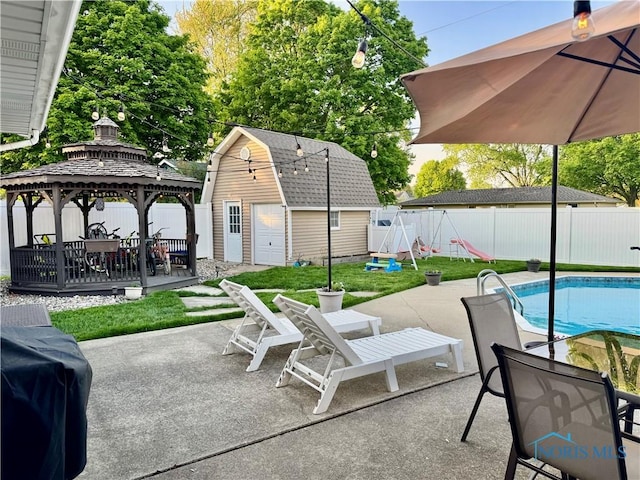 203 Oak Park Dr, Hicksville, OH 43526 - view of patio with a fenced backyard, an outdoor structure, a gazebo, and grilling area