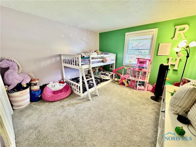 203 Oak Park Dr, Hicksville, OH 43526 - bedroom featuring carpet floors and a textured ceiling