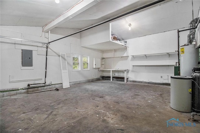 basement featuring gas water heater, electric panel, and a water softener