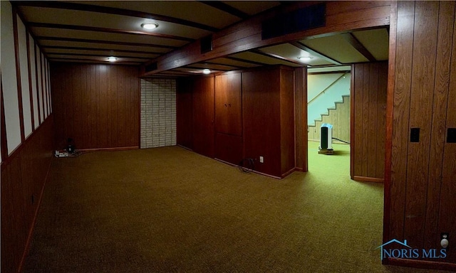 230 Orchard Ln, Upper Sandusky, OH 43351 - finished below grade area featuring wood walls, carpet, and stairway