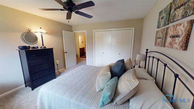 1875 State Route 101, Clyde, OH 43410 - bedroom with light colored carpet, a closet, baseboards, and a ceiling fan