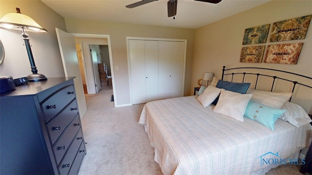 1875 State Route 101, Clyde, OH 43410 - bedroom featuring light colored carpet, a closet, and a ceiling fan