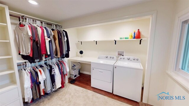 1875 State Route 101, Clyde, OH 43410 - laundry area with washer and dryer and wood finished floors