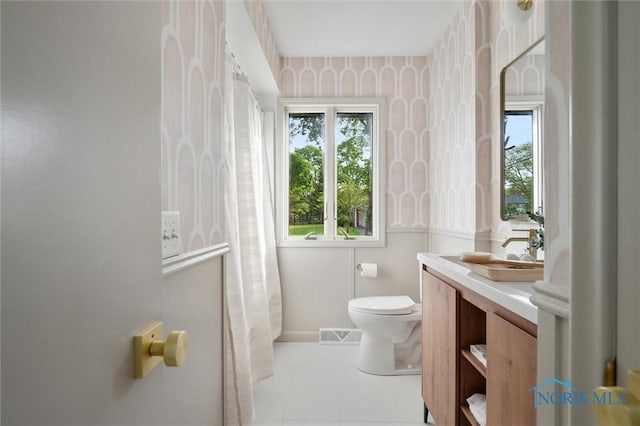 800 Pierce St, Maumee, OH 43537 - bathroom featuring toilet, tile patterned floors, vanity, and baseboards