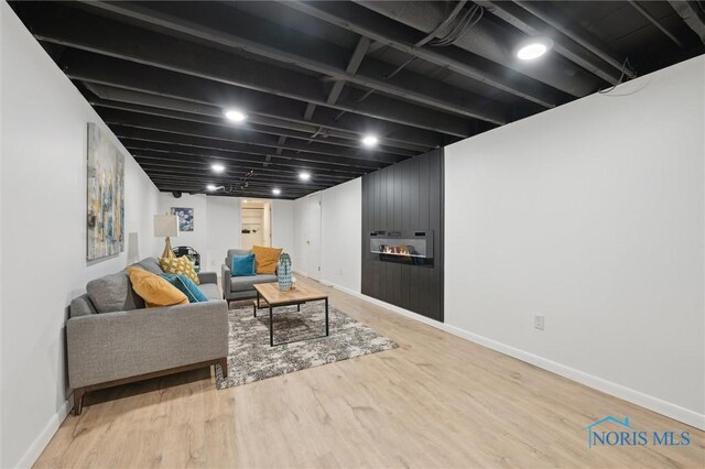800 Pierce St, Maumee, OH 43537 - living room featuring wood finished floors and baseboards