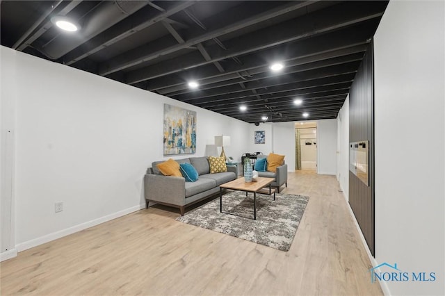 800 Pierce St, Maumee, OH 43537 - living room featuring wood finished floors and baseboards