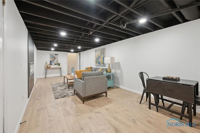 800 Pierce St, Maumee, OH 43537 - living area featuring wood finished floors and baseboards