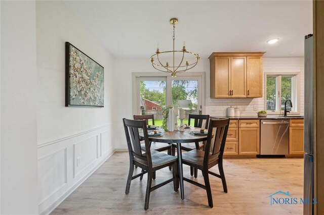 800 Pierce St, Maumee, OH 43537 - dining room with a chandelier, plenty of natural light, light wood-type flooring, and recessed lighting