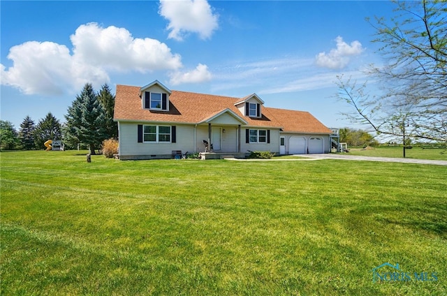 5450 Twp Rd 69, Tiffin, OH 44883 - new england style home featuring an attached garage, driveway, a front lawn, and covered porch
