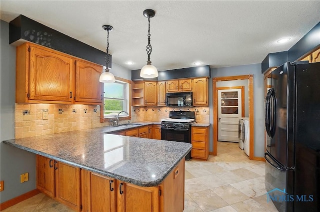 5450 Twp Rd 69, Tiffin, OH 44883 - kitchen with black appliances, a sink, a peninsula, tasteful backsplash, and brown cabinets