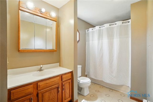 5450 Twp Rd 69, Tiffin, OH 44883 - bathroom with vanity, toilet, tile patterned floors, and shower / bath combo