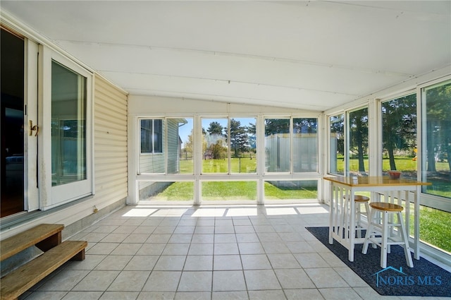 5450 Twp Rd 69, Tiffin, OH 44883 - unfurnished sunroom with vaulted ceiling and plenty of natural light