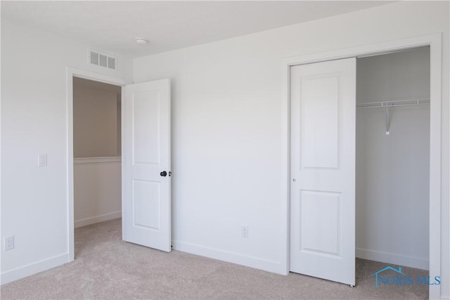 1089 Springcrest Dr, Waterville, OH 43566 - unfurnished bedroom with carpet flooring, a closet, and baseboards