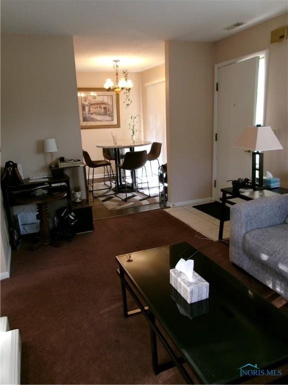 3776 Lakepointe Dr, Northwood, OH 43619 - living room with a chandelier and baseboards