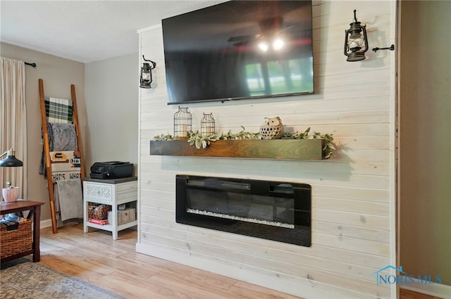 9544 Maumee Western Rd, Monclova, OH 43542 - living area featuring a fireplace and wood finished floors