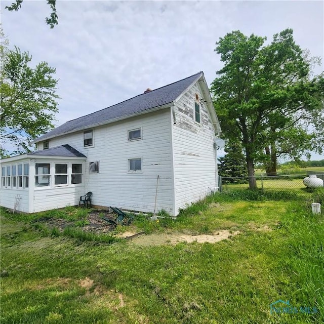 12101 County Highway 110, Upper Sandusky, OH 43351 - rear view of house with fence and a chimney