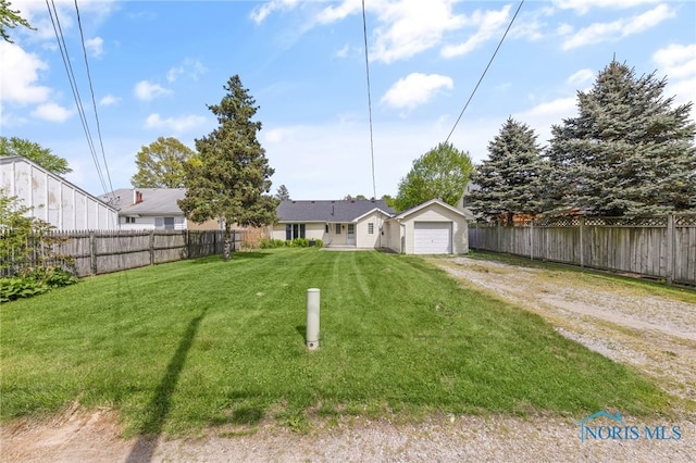 21 Pennsylvania Ave, Waterville, OH 43566 - view of front facade featuring driveway and a garage