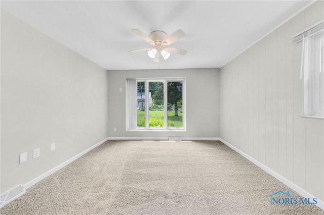 21 Pennsylvania Ave, Waterville, OH 43566 - carpeted empty room with a ceiling fan and baseboards