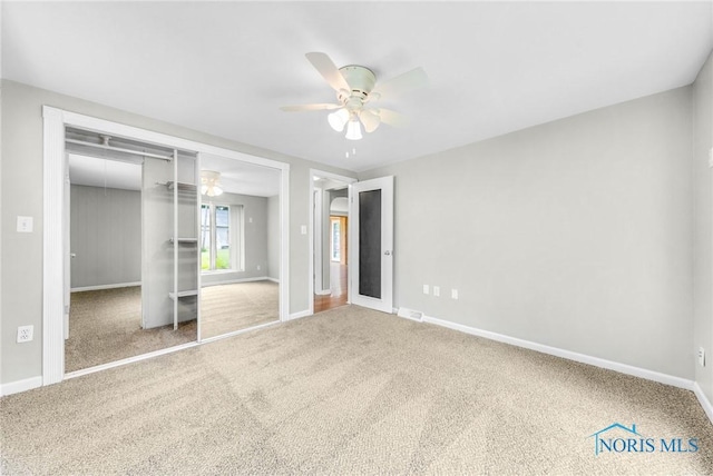 21 Pennsylvania Ave, Waterville, OH 43566 - unfurnished bedroom with carpet floors, baseboards, a closet, and ceiling fan