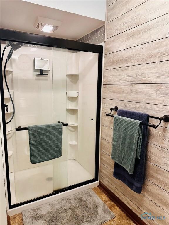 41 Salome Cir, Bluffton, OH 45817 - full bath with a stall shower and wood walls