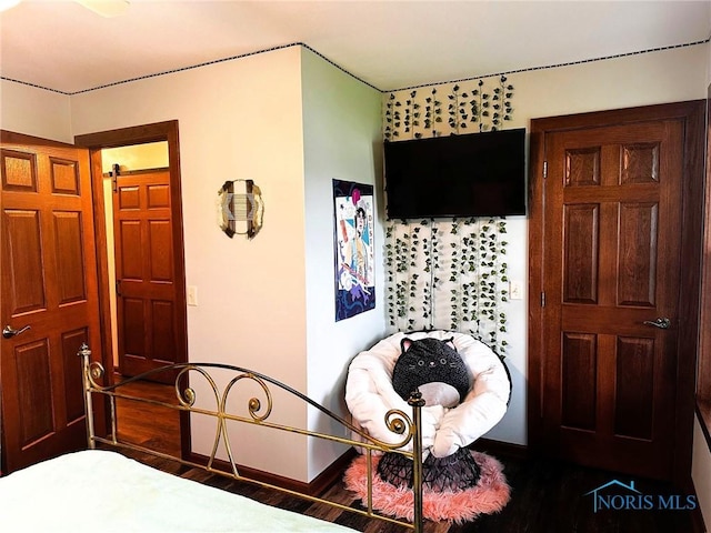 41 Salome Cir, Bluffton, OH 45817 - bedroom with dark wood-style floors and baseboards