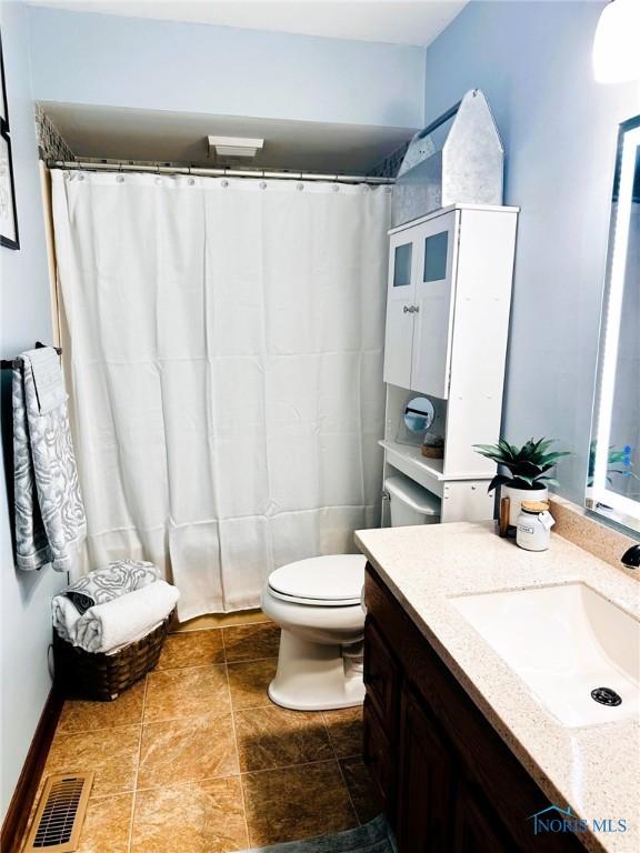41 Salome Cir, Bluffton, OH 45817 - full bathroom featuring vanity and toilet