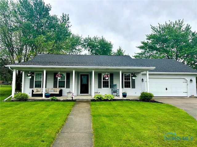 41 Salome Cir, Bluffton, OH 45817 - single story home featuring covered porch, an outdoor hangout area, a front lawn, and an attached garage