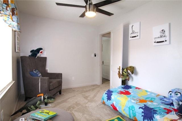 bedroom featuring carpet floors and a ceiling fan