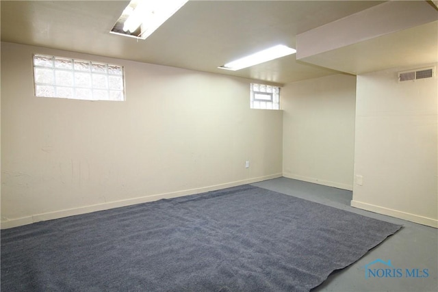 basement featuring baseboards