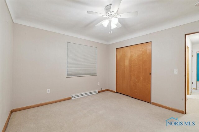 1208 Lindau St, Archbold, OH 43502 - unfurnished bedroom with carpet flooring, baseboards, and a closet