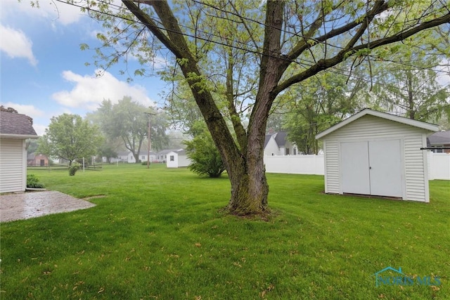 1208 Lindau St, Archbold, OH 43502 - view of yard with a storage shed and an outbuilding