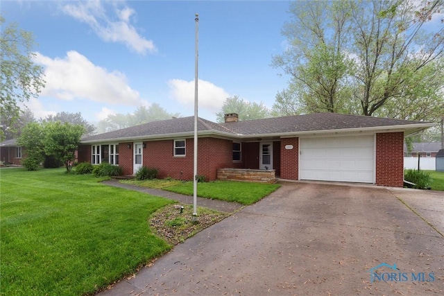 1208 Lindau St, Archbold, OH 43502 - ranch-style home featuring brick siding, an attached garage, driveway, and a front lawn