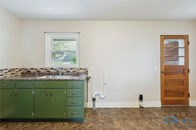 1208 Lindau St, Archbold, OH 43502 - bathroom featuring baseboards, decorative backsplash, and vanity
