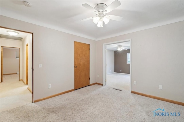 1208 Lindau St, Archbold, OH 43502 - empty room with carpet floors, a ceiling fan, a smoke detector, and baseboards