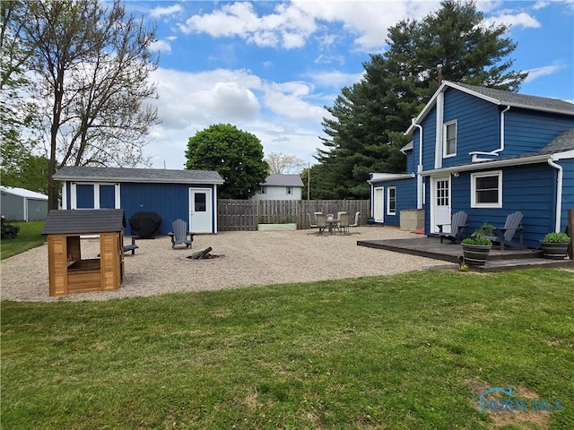 129 Stahl St, Bradner, OH 43406 - view of yard featuring a patio area and an outdoor structure
