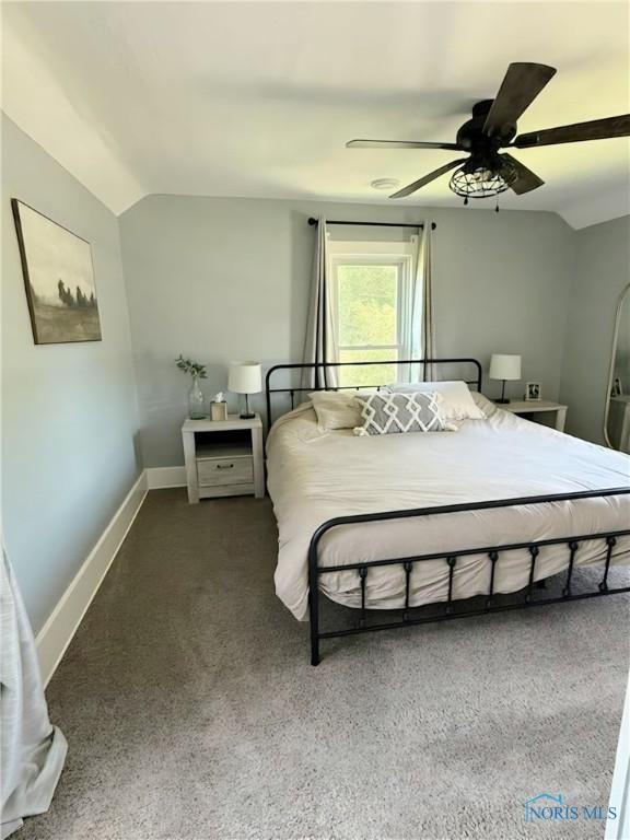 129 Stahl St, Bradner, OH 43406 - bedroom featuring lofted ceiling, carpet flooring, baseboards, and a ceiling fan