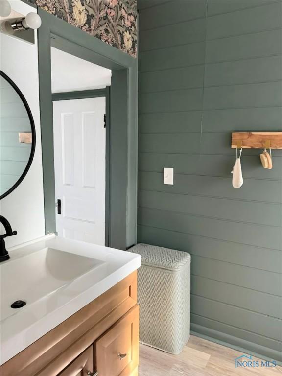 129 Stahl St, Bradner, OH 43406 - bathroom with vanity and wood finished floors