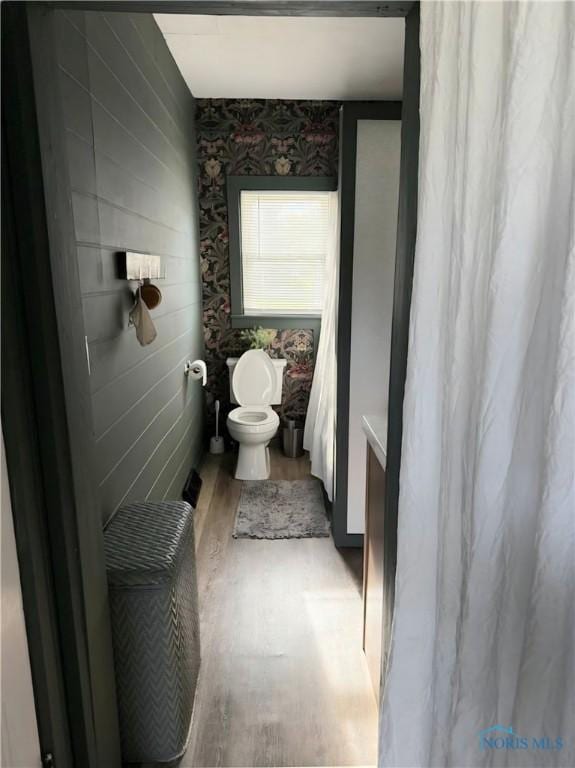 129 Stahl St, Bradner, OH 43406 - bathroom featuring toilet and wood finished floors