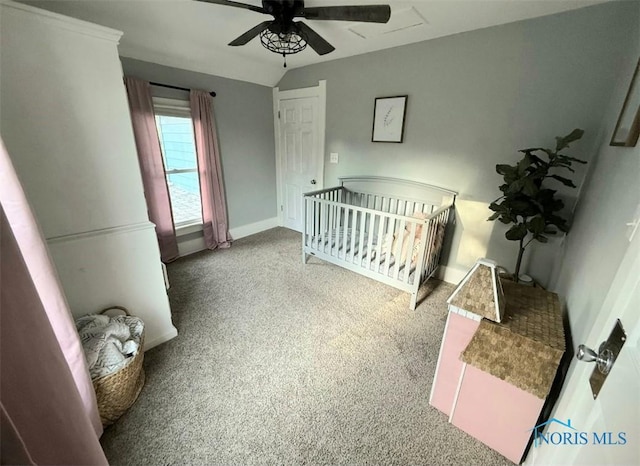 129 Stahl St, Bradner, OH 43406 - bedroom featuring carpet flooring, a ceiling fan, baseboards, and a nursery area