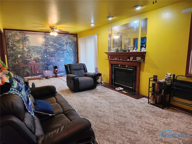713 Glenwood Rd, Rossford, OH 43460 - living room featuring ceiling fan, carpet flooring, and a fireplace with raised hearth