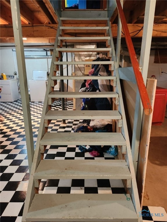 713 Glenwood Rd, Rossford, OH 43460 - stairs featuring washer / dryer and tile patterned floors