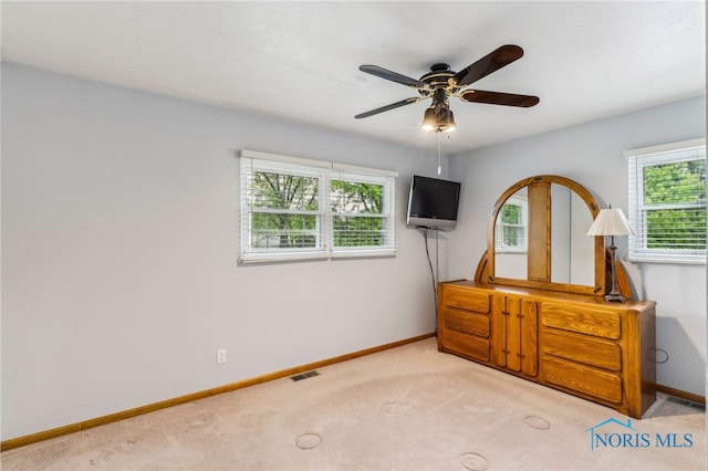 832 Maple Ln, Waterville, OH 43566 - bedroom with baseboards, carpet floors, and a ceiling fan