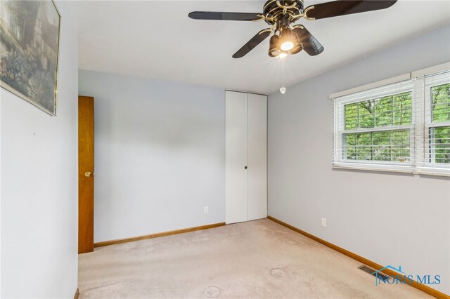 832 Maple Ln, Waterville, OH 43566 - carpeted spare room with a ceiling fan and baseboards