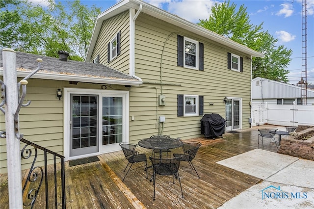 832 Maple Ln, Waterville, OH 43566 - rear view of property with a deck and outdoor dining space