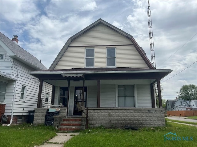 1661 Oak St, Toledo, OH 43605 - dutch colonial with covered porch and a gambrel roof