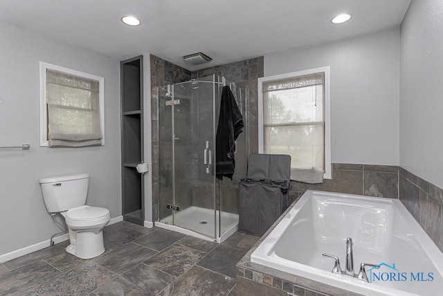 17315 County Road R, Napoleon, OH 43545 - full bathroom featuring toilet, a garden tub, a stall shower, baseboards, and recessed lighting