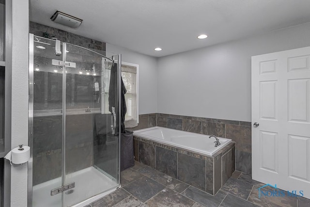 17315 County Road R, Napoleon, OH 43545 - bathroom featuring a garden tub, a stall shower, recessed lighting, and stone finish floors