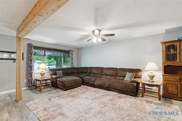 417 Indian Rd, Wauseon, OH 43567 - living area featuring a ceiling fan and light wood finished floors