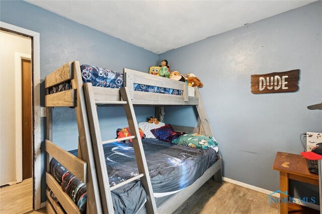 417 Indian Rd, Wauseon, OH 43567 - bedroom with wood finished floors